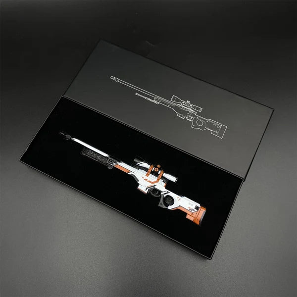 AWP Asiimov miniature lying in its open gift box