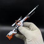 AWP Asiimov miniature held in a gloved hand, showing its 1:5 size