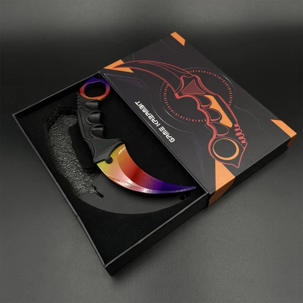 Karambit Fade trainer lying in its open printed gift box