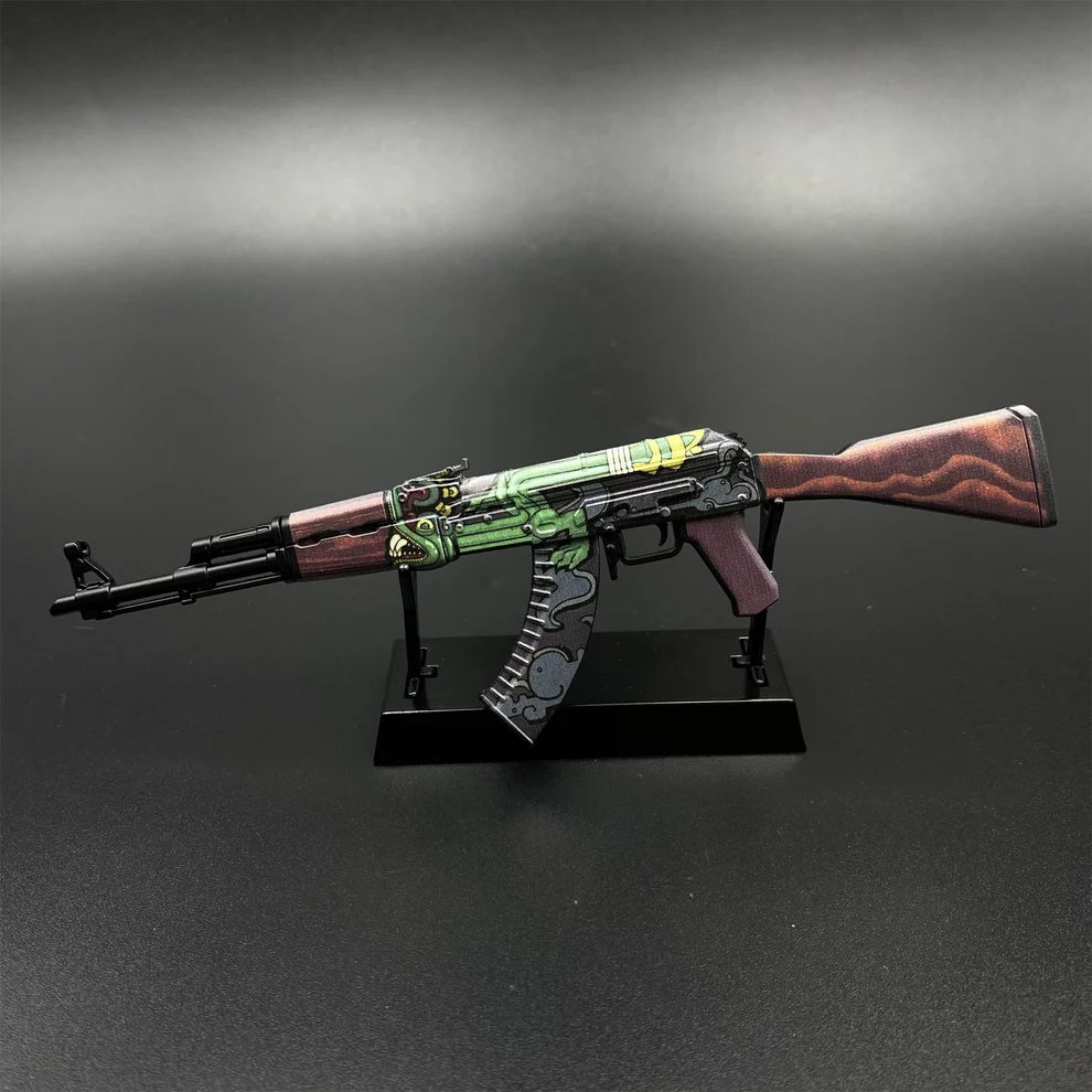 AK-47 Fire Serpent miniature on its black display stand