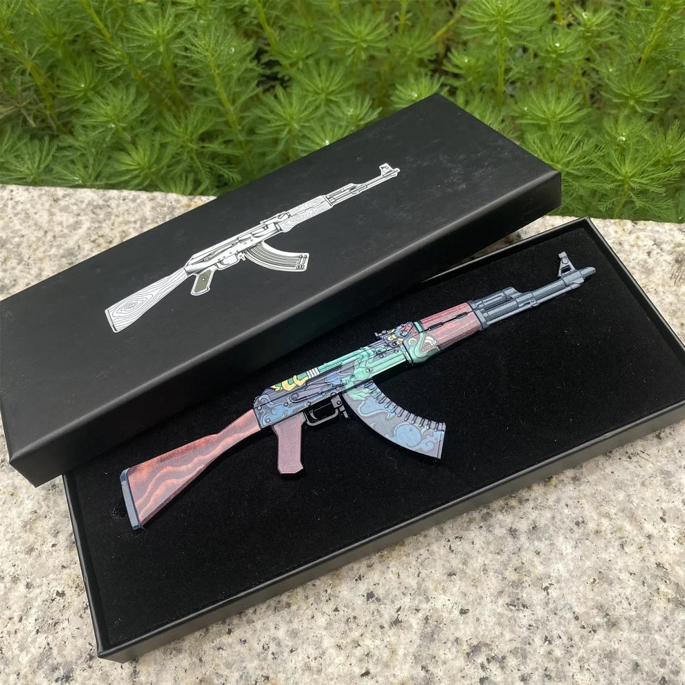 AK-47 Fire Serpent replica in its open printed gift box