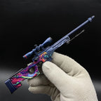 AWP Hyper Beast replica held in a gloved hand, showing its size