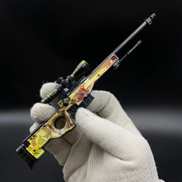 AWP Dragon Lore miniature held in a gloved hand, showing its size
